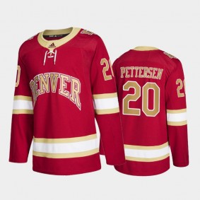 Denver Pioneers Emilio Pettersen #20 College Hockey Red Road Jersey