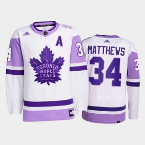 Auston Matthews #34 Toronto Maple Leafs 2021 HockeyFightsCancer White Primegreen Jersey