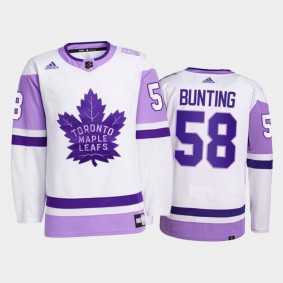 Michael Bunting #58 Toronto Maple Leafs 2021 HockeyFightsCancer White Primegreen Jersey